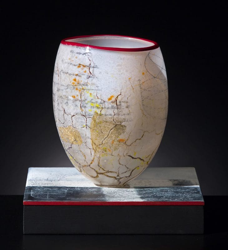 A vase with the world map on it