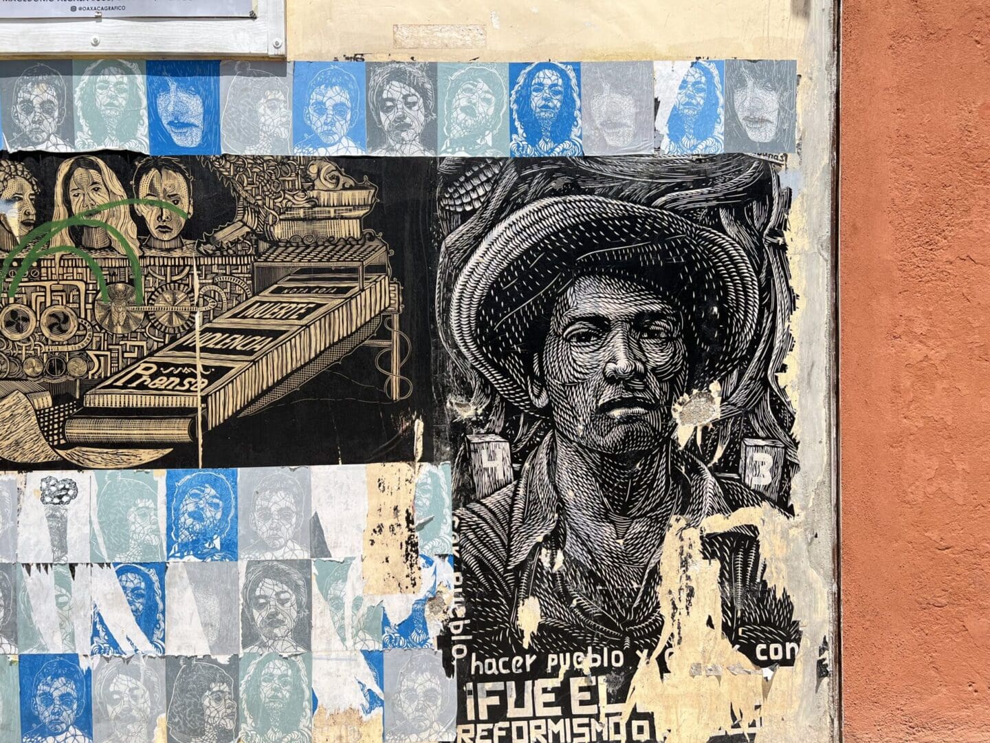 A mural on the side of a building with a man in a hat.